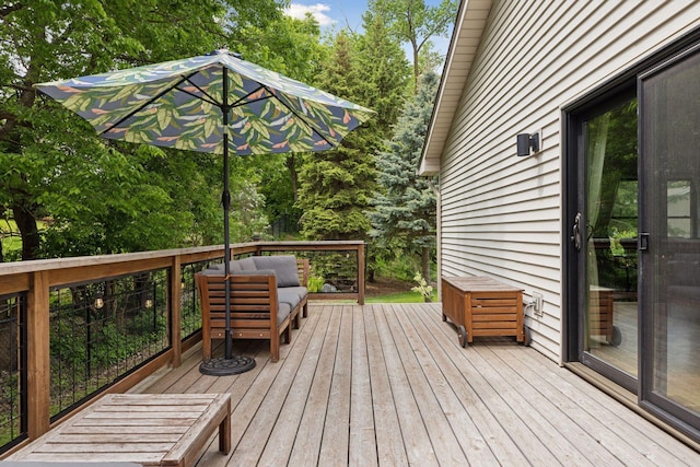 1283 Bidwell St, West Saint Paul, MN 55118 - wooden deck with an outdoor living space and view of scattered trees