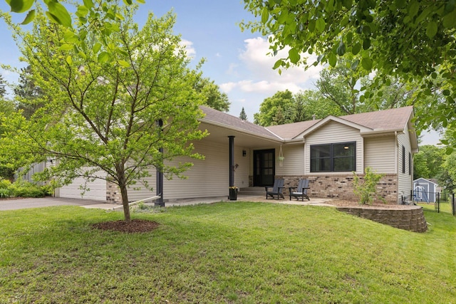 1283 Bidwell St, West Saint Paul, MN 55118 - single story home featuring brick siding, a garage, driveway, and a shingled roof