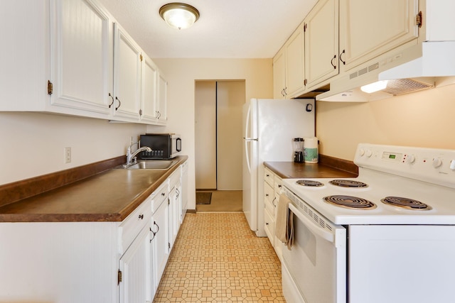4566 Cedar Lake Rd S Unit 3, Saint Louis Park, MN 55416 - kitchen with white appliances, under cabinet range hood, dark countertops, and white cabinets