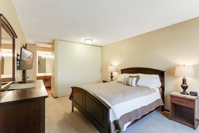 4566 Cedar Lake Rd S Unit 3, Saint Louis Park, MN 55416 - bedroom with light colored carpet and connected bathroom