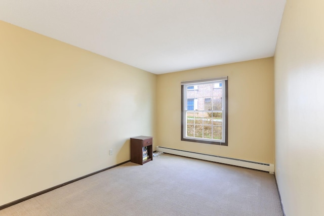 4566 Cedar Lake Rd S Unit 3, Saint Louis Park, MN 55416 - unfurnished room featuring baseboard heating, light colored carpet, and baseboards