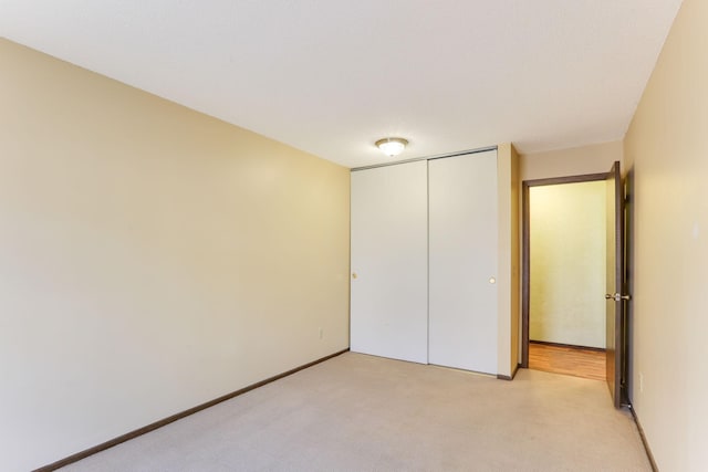 4566 Cedar Lake Rd S Unit 3, Saint Louis Park, MN 55416 - unfurnished bedroom with light colored carpet, a closet, and baseboards