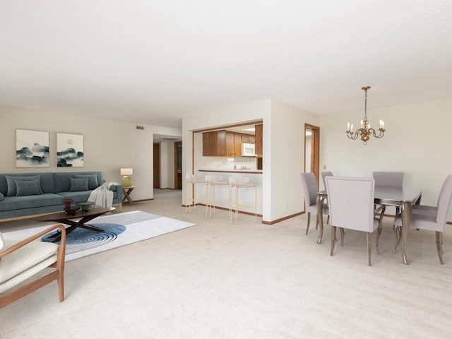 5501 Dewey Hill Rd Unit 233, Edina, MN 55439 - living room with light carpet and a notable chandelier