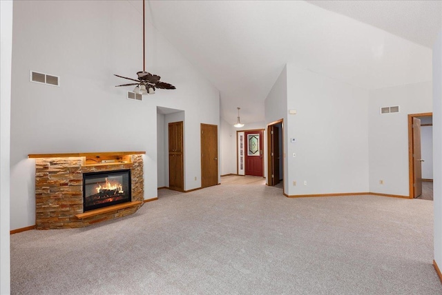 2228 White Pine Ct, Hudson, WI 54016 - unfurnished living room featuring high vaulted ceiling, carpet floors, a fireplace, and a ceiling fan
