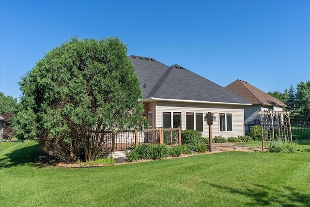 2228 White Pine Ct, Hudson, WI 54016 - rear view of property with a deck and roof with shingles
