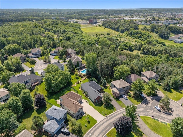 2228 White Pine Ct, Hudson, WI 54016 - aerial perspective of suburban area with a heavily wooded area