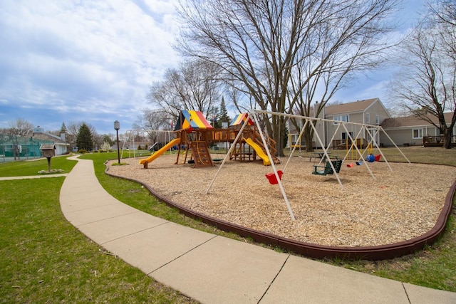 community play area with a yard