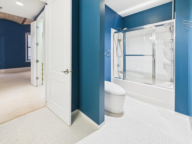 300 Wall St Unit 201, Saint Paul, MN 55101 - bathroom with baseboards, toilet, and combined bath / shower with glass door