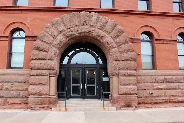 300 Wall St Unit 201, Saint Paul, MN 55101 - property entrance with french doors, brick siding, and stone siding