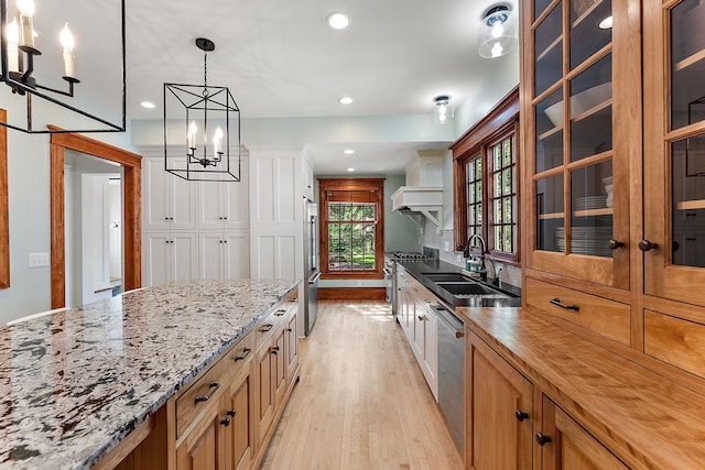 5224 17th Ave S, Minneapolis, MN 55417 - kitchen with high quality appliances, light wood finished floors, wood counters, recessed lighting, and tasteful backsplash