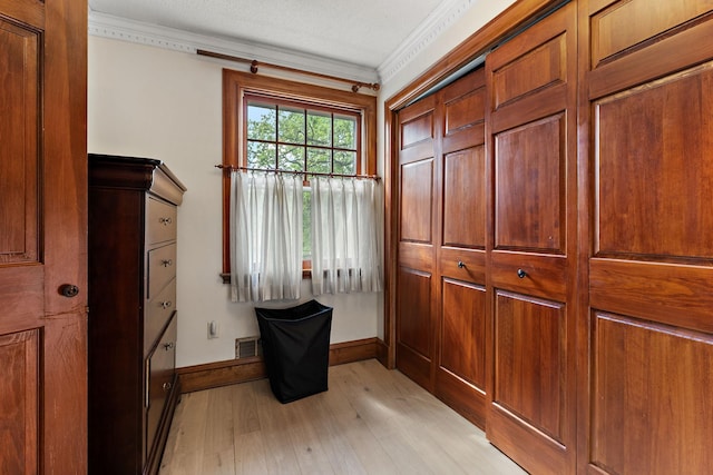 5224 17th Ave S, Minneapolis, MN 55417 - doorway with light wood finished floors and crown molding