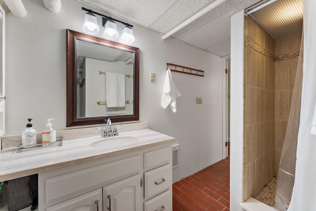 5224 17th Ave S, Minneapolis, MN 55417 - full bath featuring vanity, a shower stall, brick patterned floors, and a drop ceiling