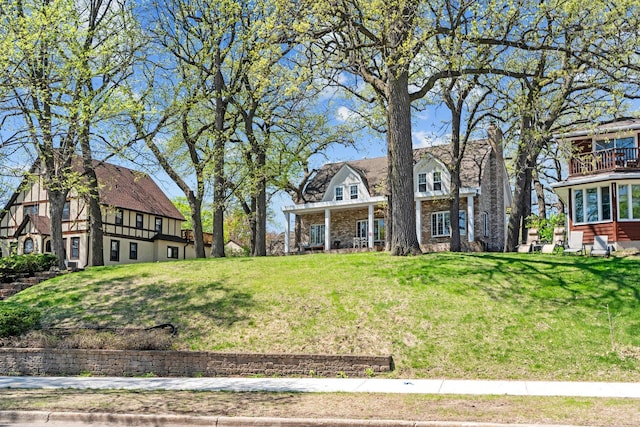 5224 17th Ave S, Minneapolis, MN 55417 - view of front facade featuring a front lawn and a balcony