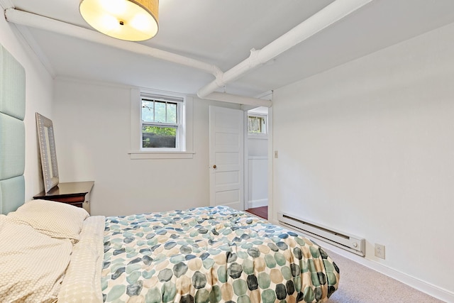 5224 17th Ave S, Minneapolis, MN 55417 - bedroom featuring a baseboard heating unit and carpet floors