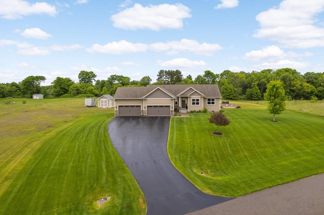 3839 189th Ln NW, Oak Grove, MN 55303 - ranch-style home featuring an attached garage, driveway, a front lawn, and view of scattered trees