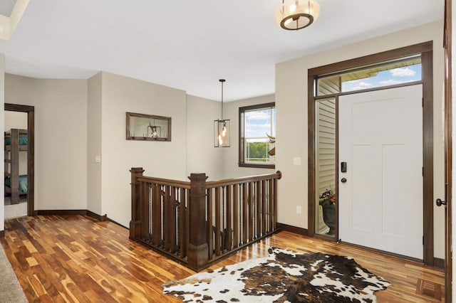3839 189th Ln NW, Oak Grove, MN 55303 - foyer entrance featuring wood finished floors and baseboards