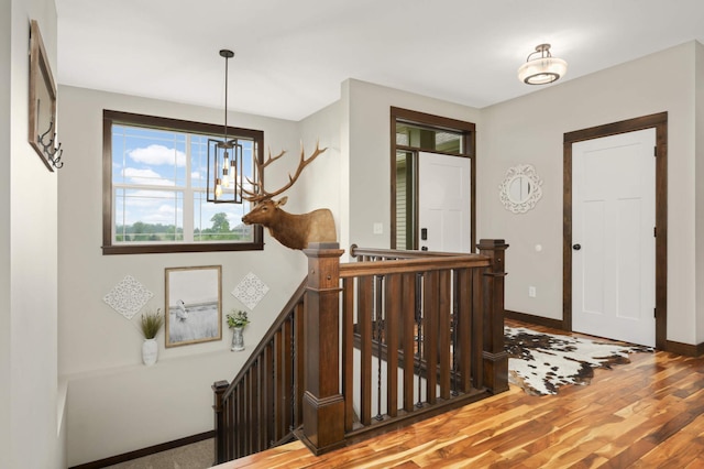 3839 189th Ln NW, Oak Grove, MN 55303 - entrance foyer featuring a chandelier, light wood finished floors, and baseboards