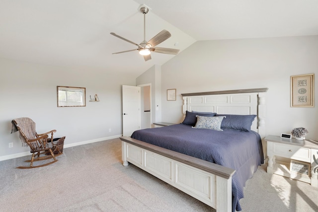 bedroom with vaulted ceiling, light colored carpet, and ceiling fan