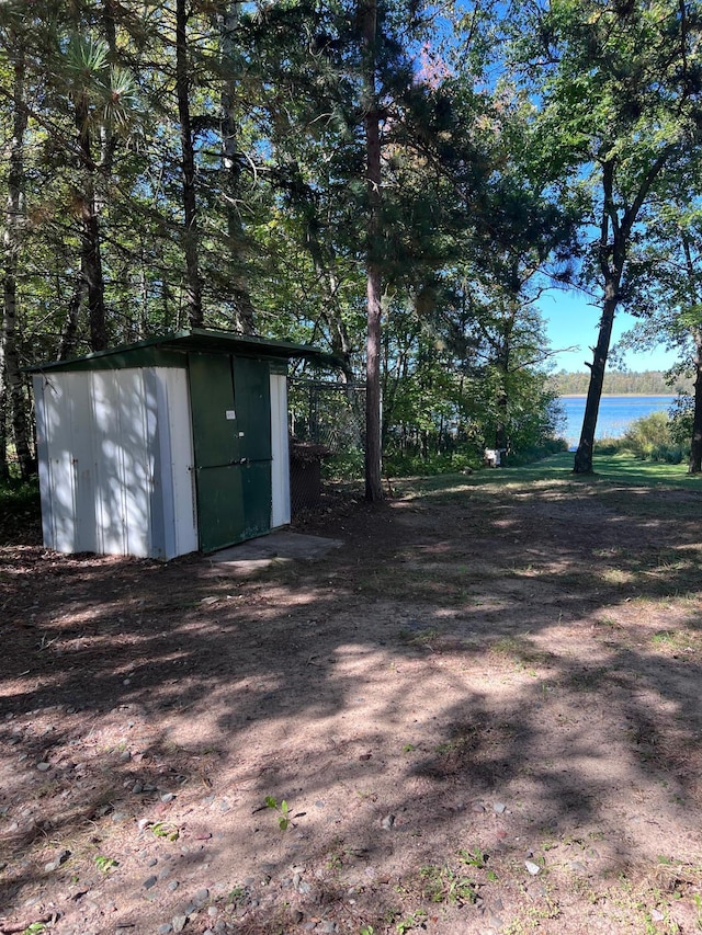 view of shed featuring a water view