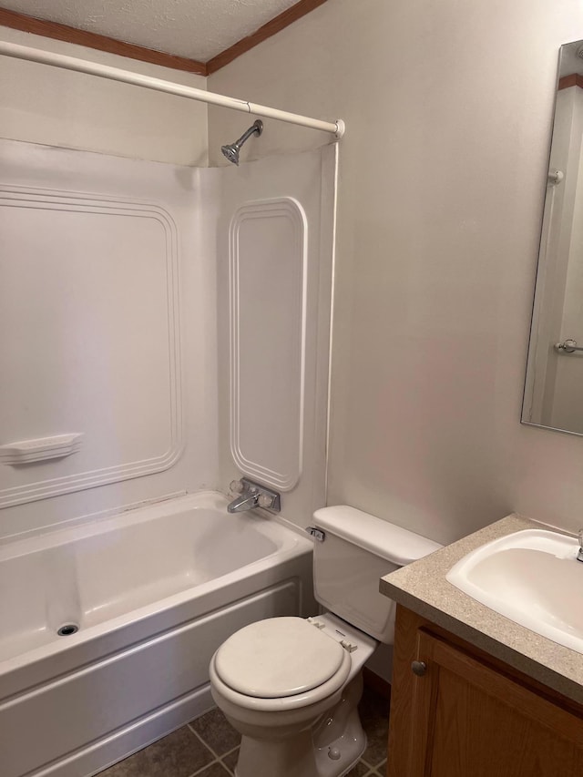 bathroom with toilet, vanity, shower / bathtub combination, tile patterned floors, and a textured ceiling