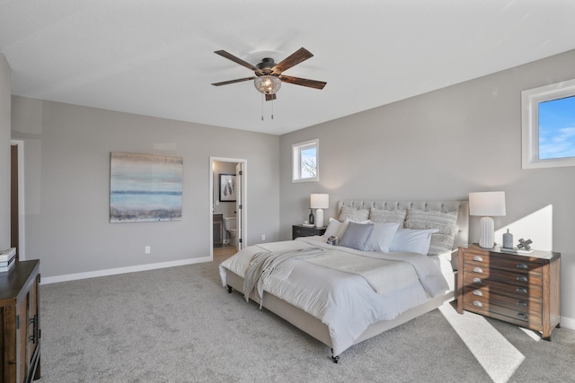 1234 Willowbrook Cir, Delano, MN 55328 - carpeted bedroom featuring baseboards, ceiling fan, and connected bathroom