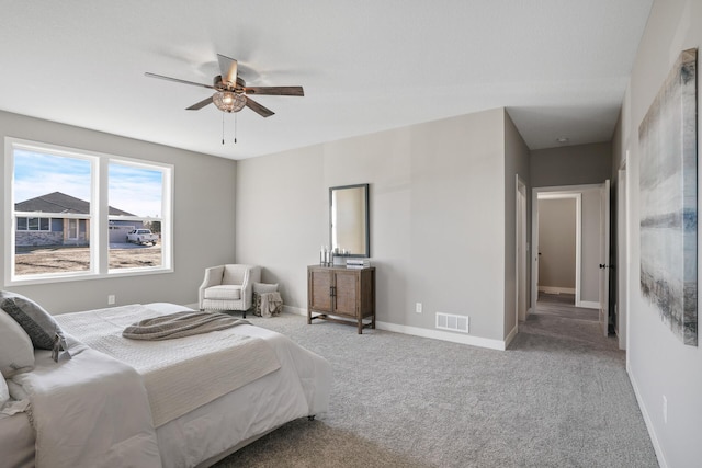 1234 Willowbrook Cir, Delano, MN 55328 - carpeted bedroom featuring ceiling fan, baseboards, and visible vents