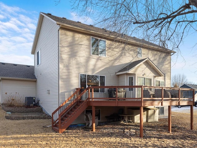 2052 Wilhelm Ct, Shakopee, MN 55379 - back of house with a deck, central AC unit, and stairway