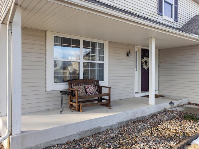 2052 Wilhelm Ct, Shakopee, MN 55379 - property entrance featuring a porch and a shingled roof
