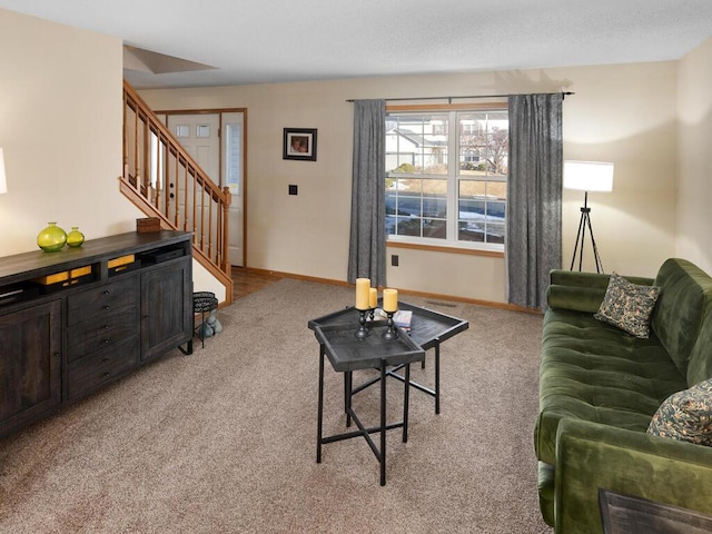 2052 Wilhelm Ct, Shakopee, MN 55379 - living area with light colored carpet, stairway, and baseboards