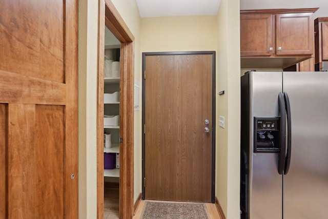 3850 Plymouth Blvd Unit 318, Plymouth, MN 55446 - kitchen with stainless steel fridge and light wood-style flooring