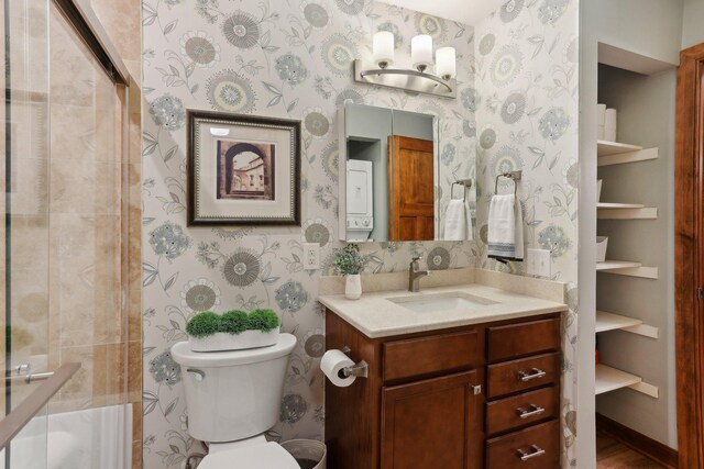 3850 Plymouth Blvd Unit 318, Plymouth, MN 55446 - full bathroom with a shower stall, toilet, and wallpapered walls