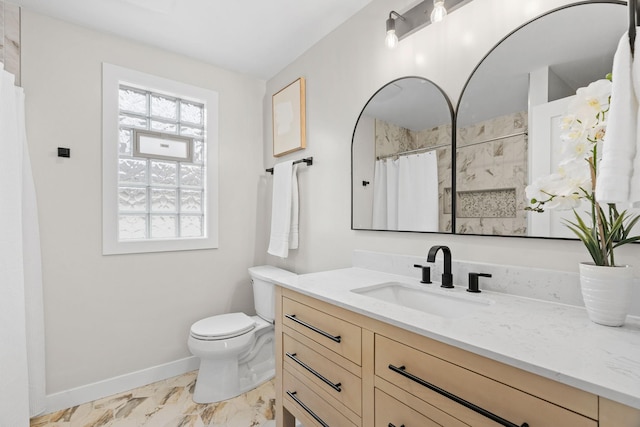 full bathroom featuring marble look tile flooring, baseboards, vanity, toilet, and a shower with curtain