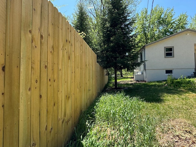 view of yard featuring fence