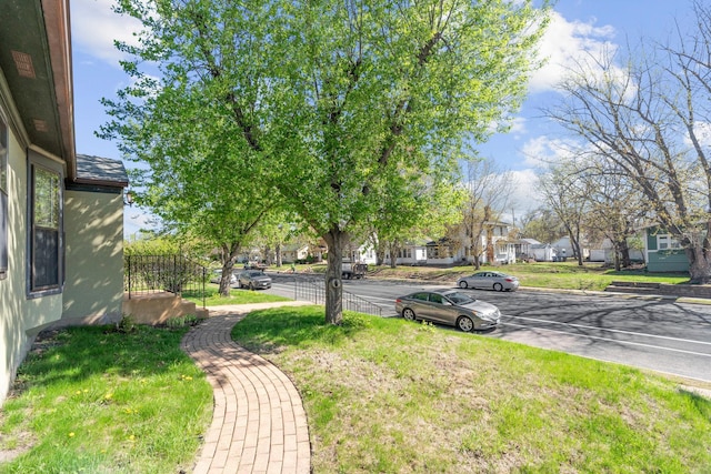 view of yard featuring a residential view