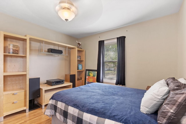 bedroom with light wood-type flooring