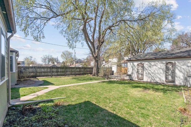 view of yard with a fenced backyard