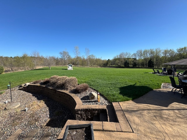 view of yard with a patio area
