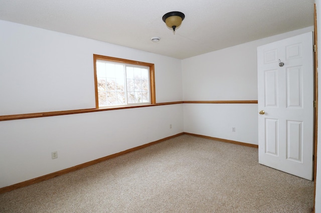 1728 Riverside Dr, Shakopee, MN 55379 - carpeted empty room featuring baseboards
