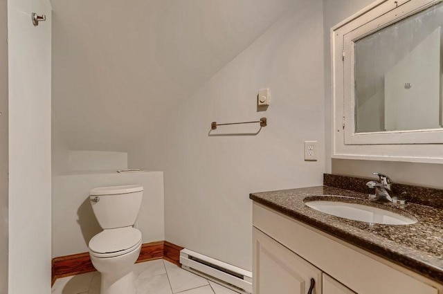 bathroom featuring a baseboard radiator, baseboards, toilet, vaulted ceiling, and vanity