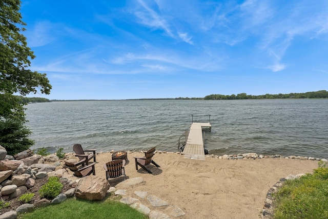 11831 Gulden Ave NW, Maple Lake, MN 55358 - dock area featuring an outdoor fire pit and a water view
