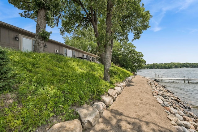 11831 Gulden Ave NW, Maple Lake, MN 55358 - view of yard featuring a water view and a boat dock