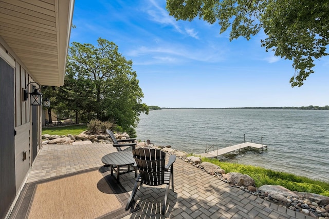 11831 Gulden Ave NW, Maple Lake, MN 55358 - view of patio / terrace featuring a water view