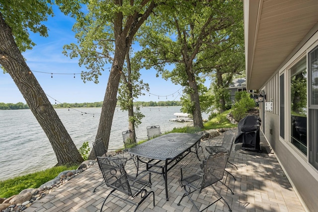 11831 Gulden Ave NW, Maple Lake, MN 55358 - view of patio featuring a water view, outdoor dining space, and area for grilling
