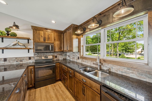 11831 Gulden Ave NW, Maple Lake, MN 55358 - kitchen featuring appliances with stainless steel finishes, decorative backsplash, light wood-type flooring, dark stone countertops, and open shelves