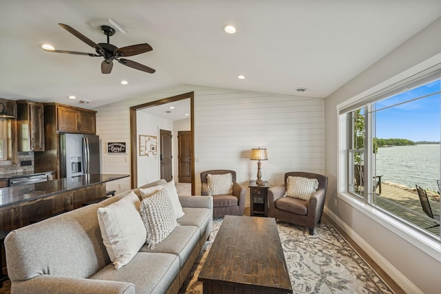 11831 Gulden Ave NW, Maple Lake, MN 55358 - living room featuring vaulted ceiling, ceiling fan, wooden walls, a water view, and recessed lighting