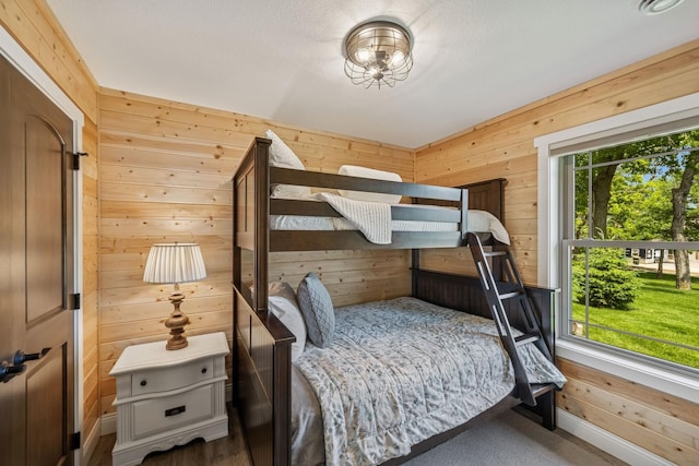 11831 Gulden Ave NW, Maple Lake, MN 55358 - carpeted bedroom featuring wooden walls