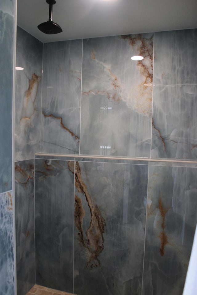 bathroom view of tiled shower