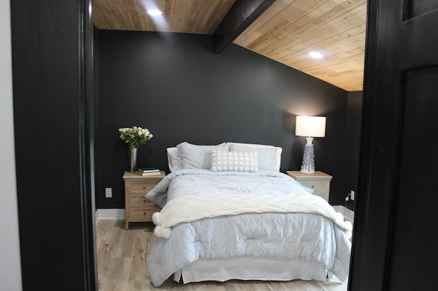 bedroom with wooden ceiling, wood finished floors, recessed lighting, and baseboards