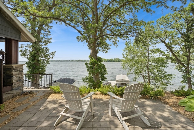 11847 Gulden Ave NW, Maple Lake, MN 55358 - view of patio with a water view