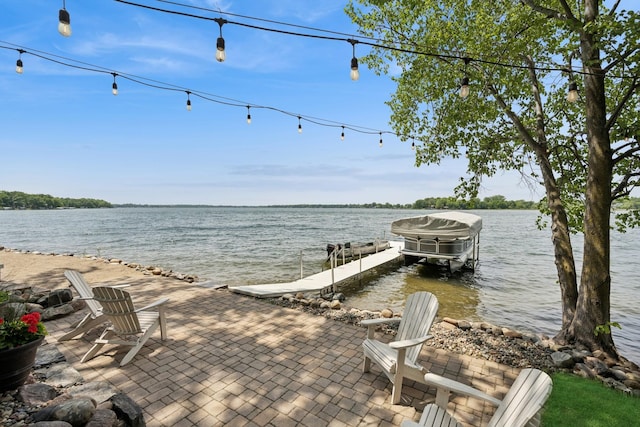 11847 Gulden Ave NW, Maple Lake, MN 55358 - dock area with a water view, boat lift, and a patio